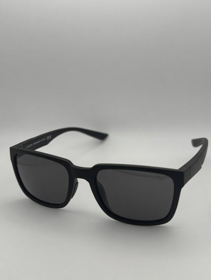 Black sunglasses on a light gray background